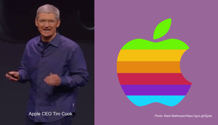 Apple CEO Tim Cook and old rainbow Apple corporate logo